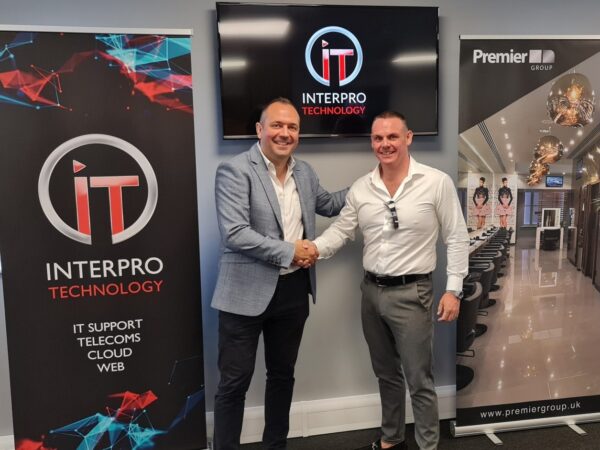 Interpro Technology Solutions Managing Director Mark Abrams, left, has received the keys to the company’s new 2,000 sq ft headquarters at Fareham Heights business park from Adrian Donald, Managing Director of Premier Interior Systems